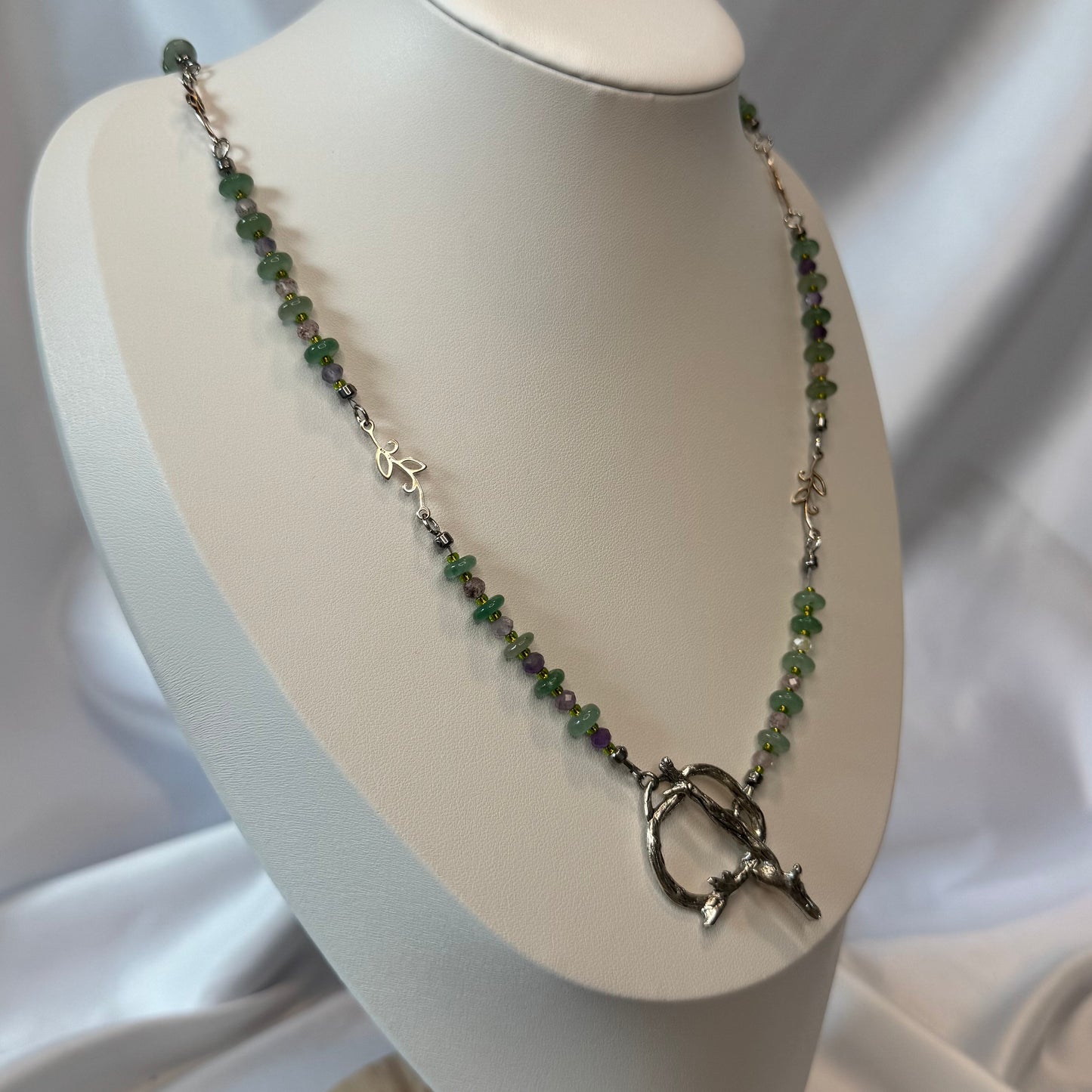 Green Aventurine Crystal Necklace Featuring Leaf Focals and a Tree Branch Closure